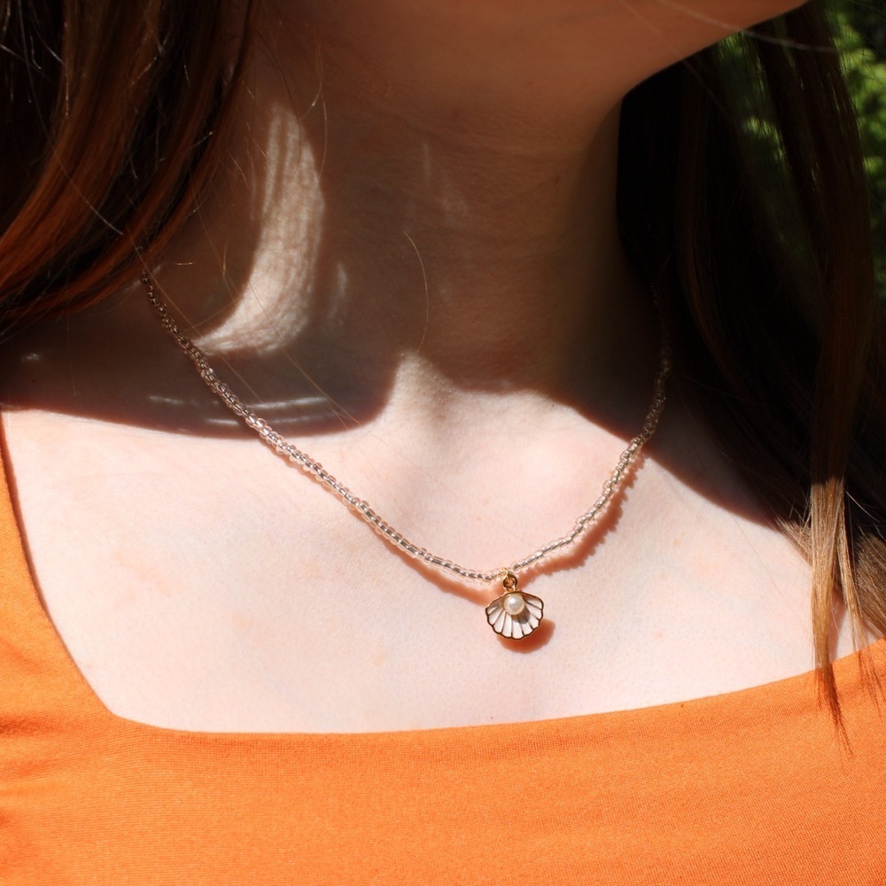Handmade pink tinted beaded necklace gold with shell pendant